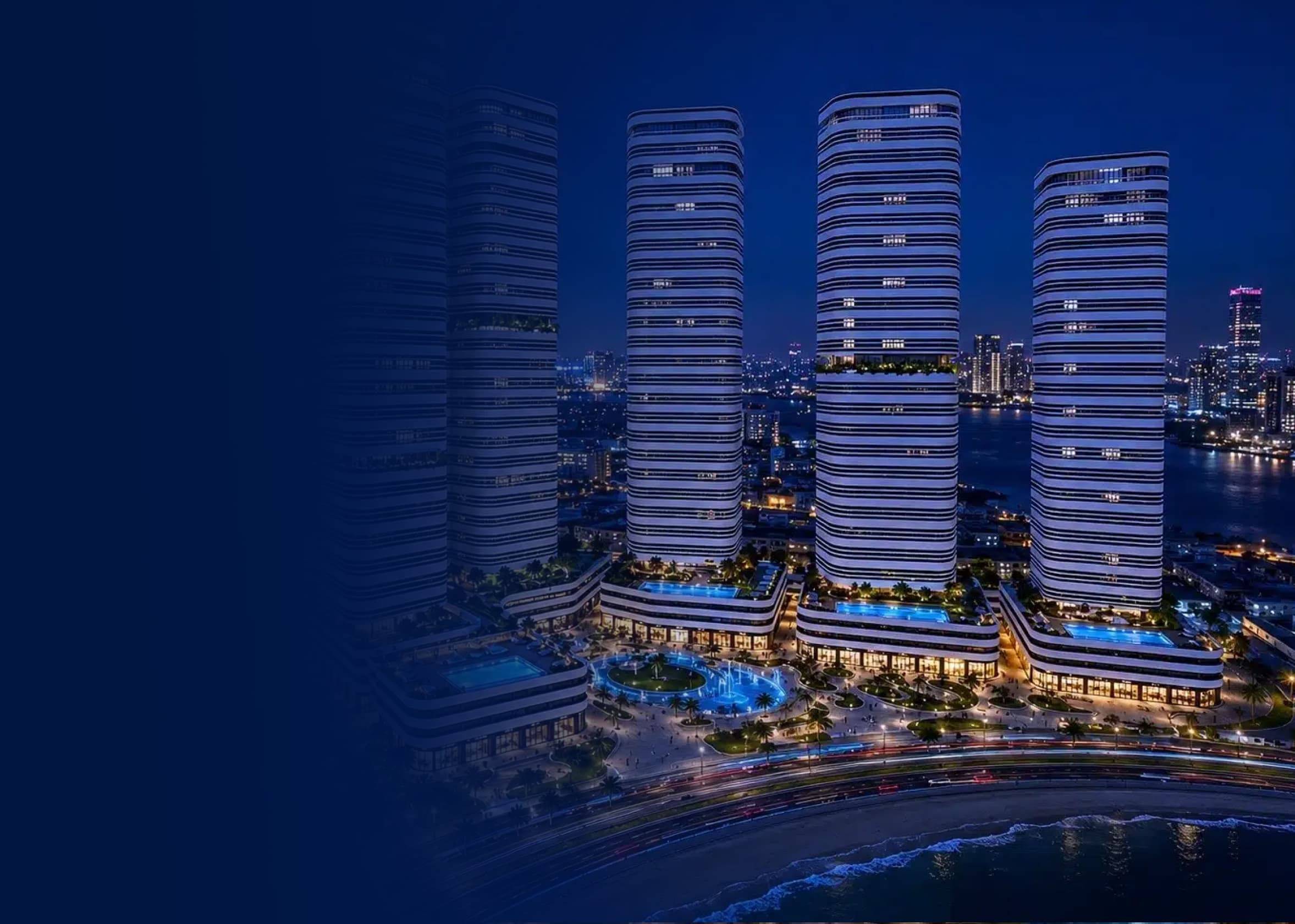 Linar towers illuminated over the Al Mamzar beach at night